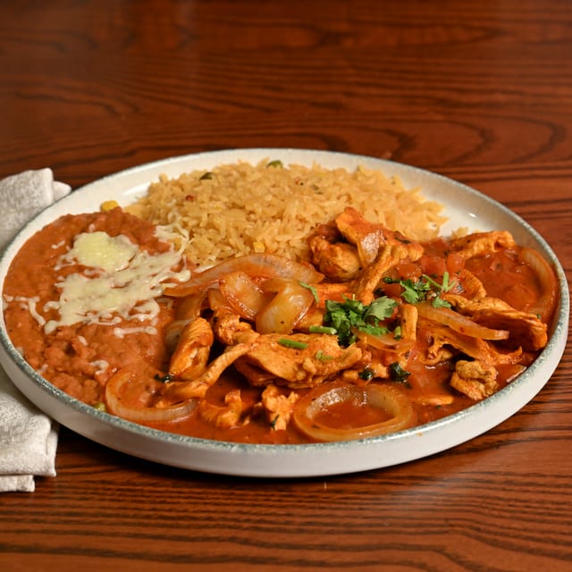 Pollo Guisado.